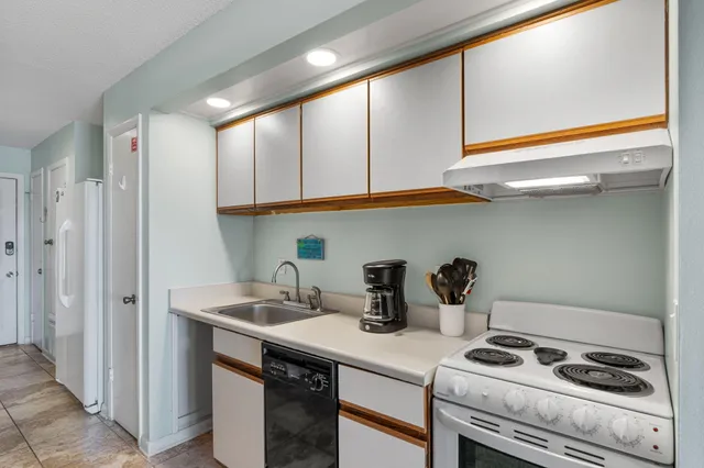 a living room with furniture chess board and a couch