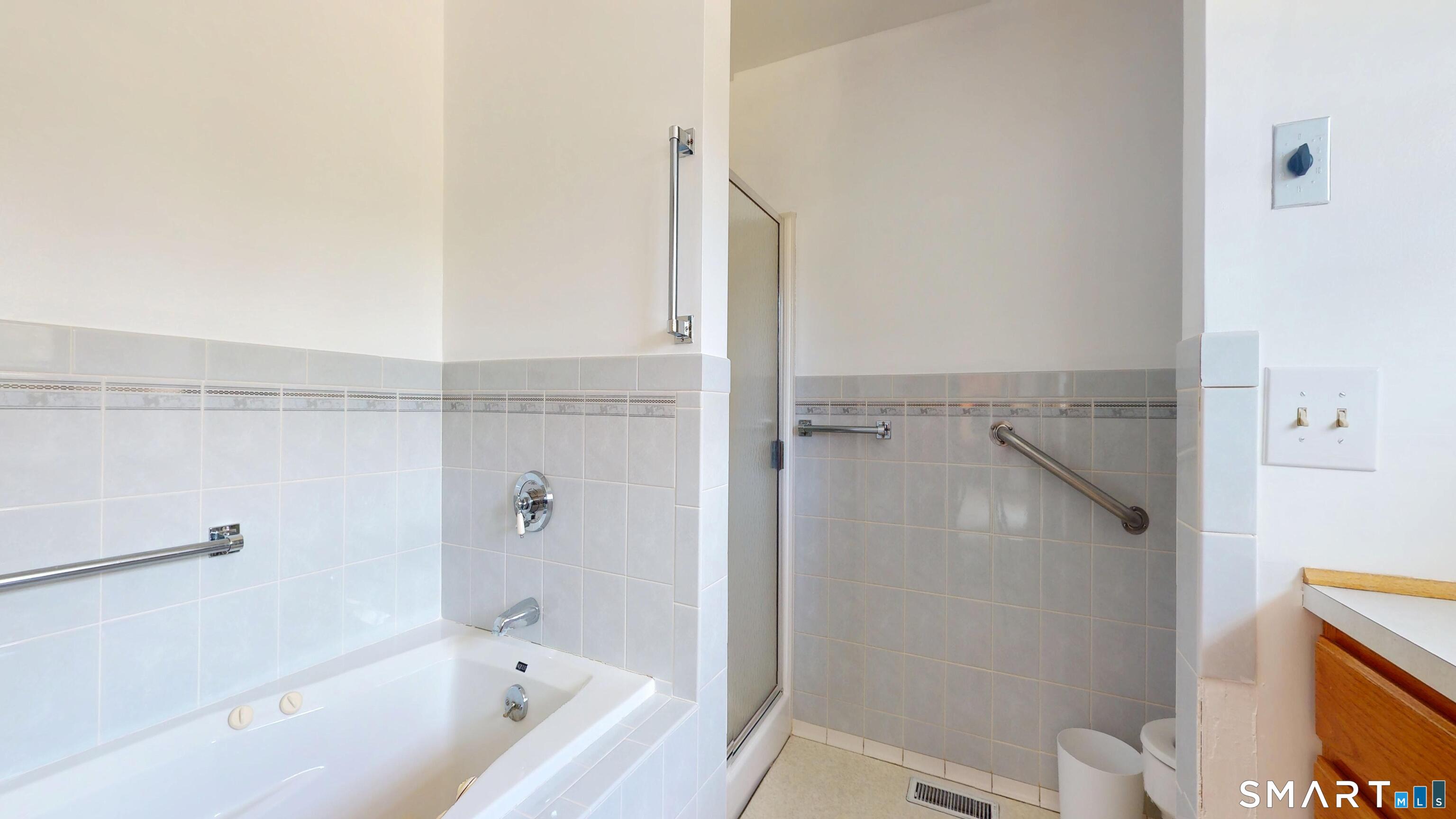 41 Mill Bridge Road Eastford, CT 06242 - Photo 18 of 39 a bathroom with a bathtub and shower