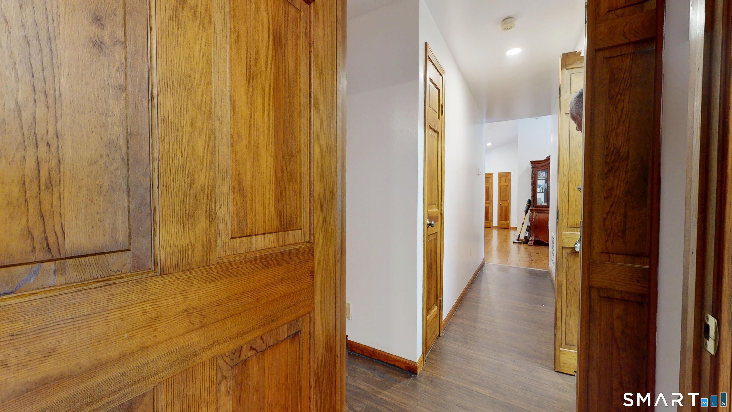 41 Mill Bridge Road Eastford, CT 06242 - Photo 21 of 39 a view of a hallway with wooden floor