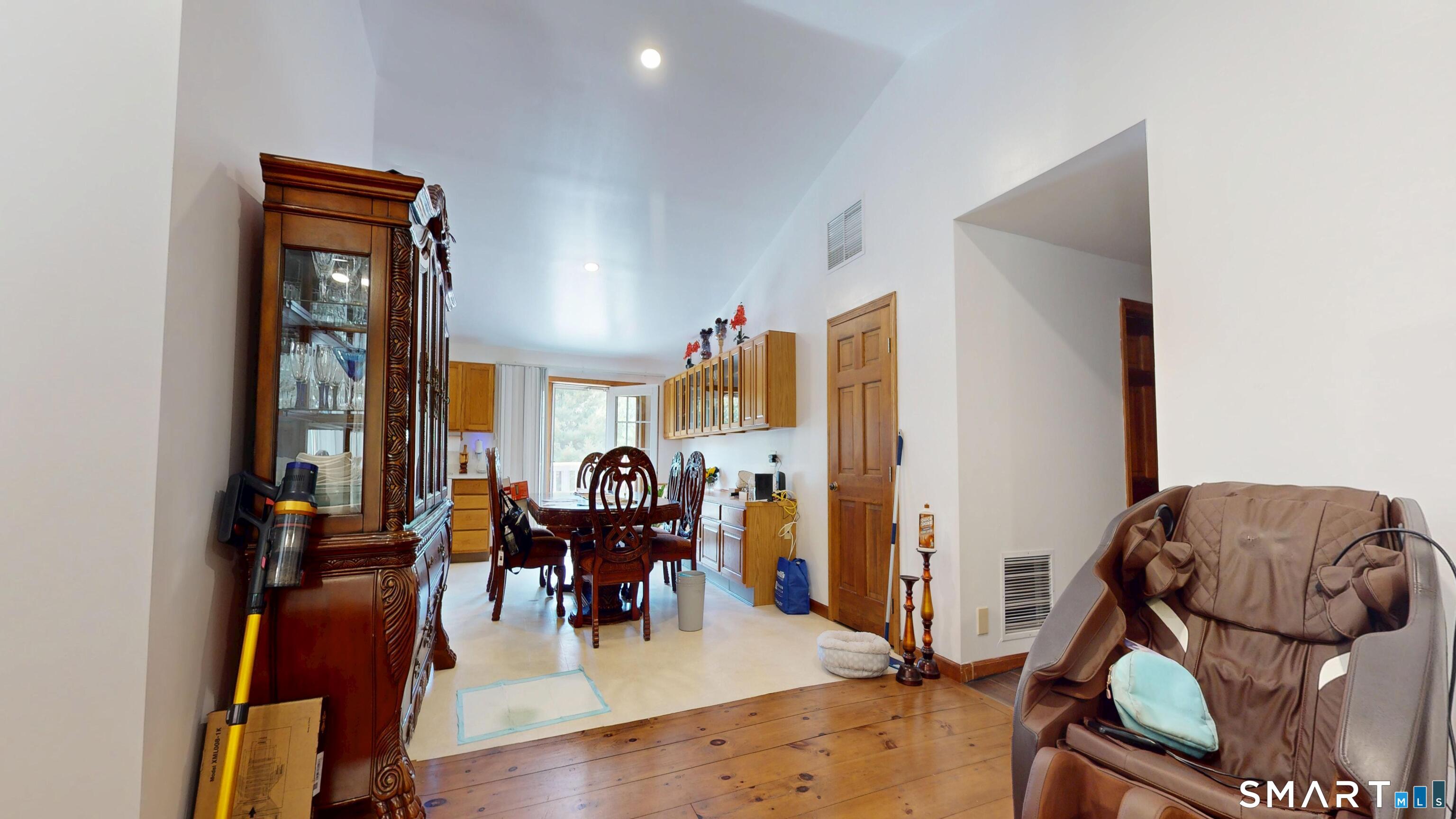 41 Mill Bridge Road Eastford, CT 06242 - Photo 26 of 39 a view of a livingroom with furniture and hardwood floor