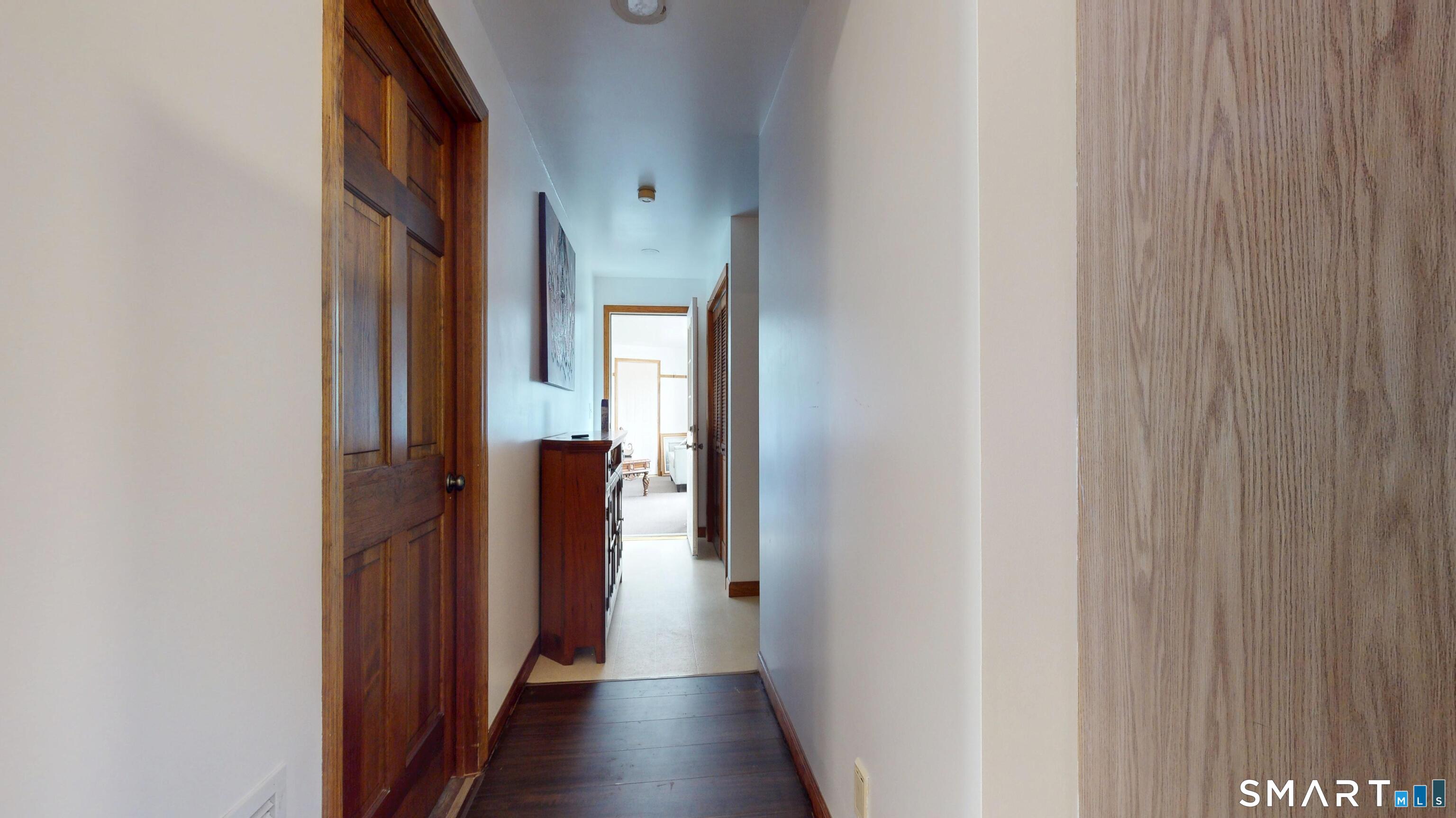 41 Mill Bridge Road Eastford, CT 06242 - Photo 30 of 39 a view of a hallway with wooden floor