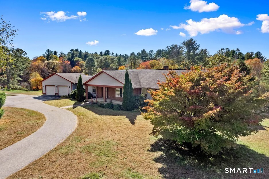 41 Mill Bridge Road Eastford, CT 06242 - Photo 35 of 39 a view of a house with a yard