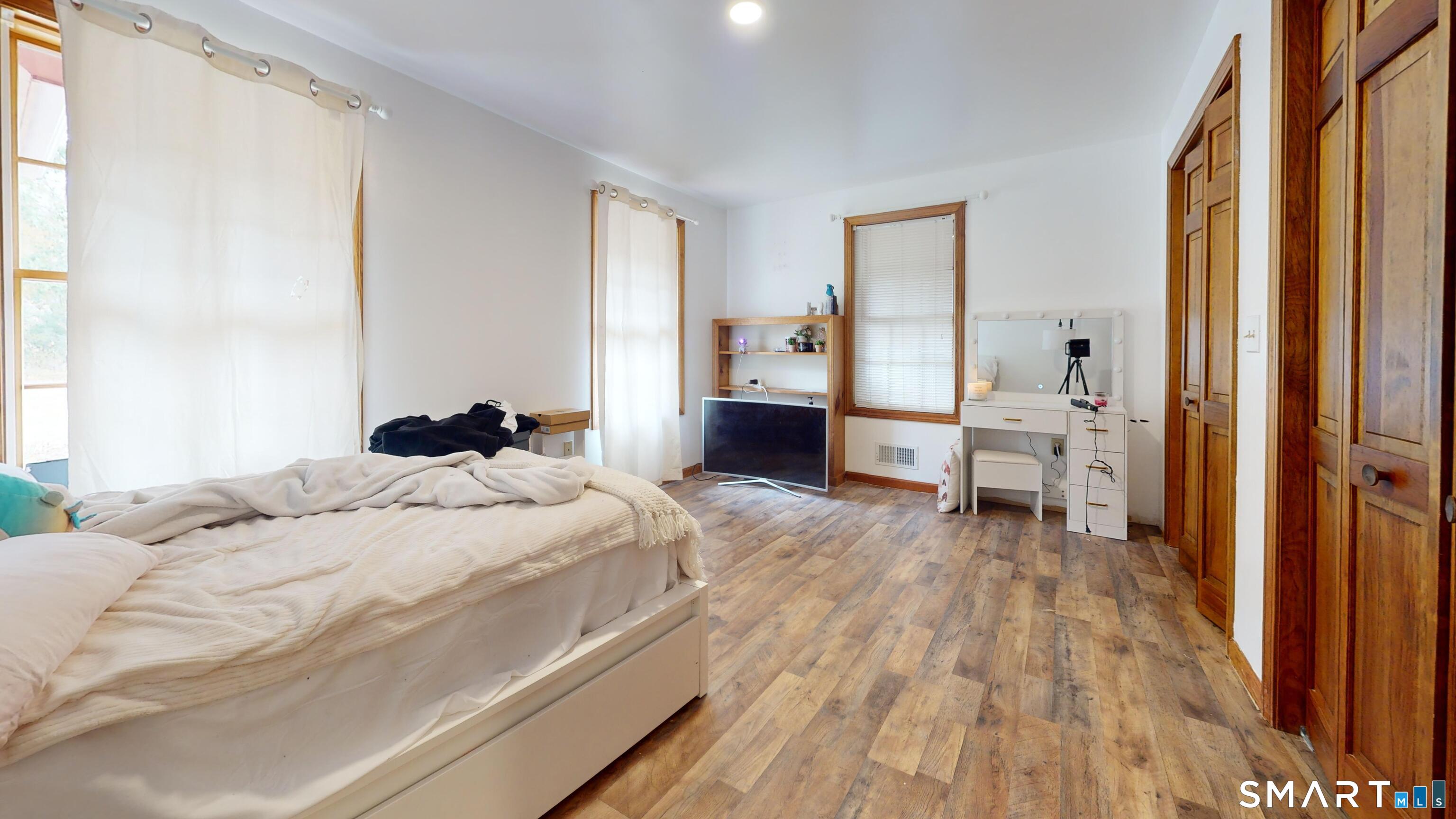 41 Mill Bridge Road Eastford, CT 06242 - Photo 38 of 39 a bed room with a bed and a chair