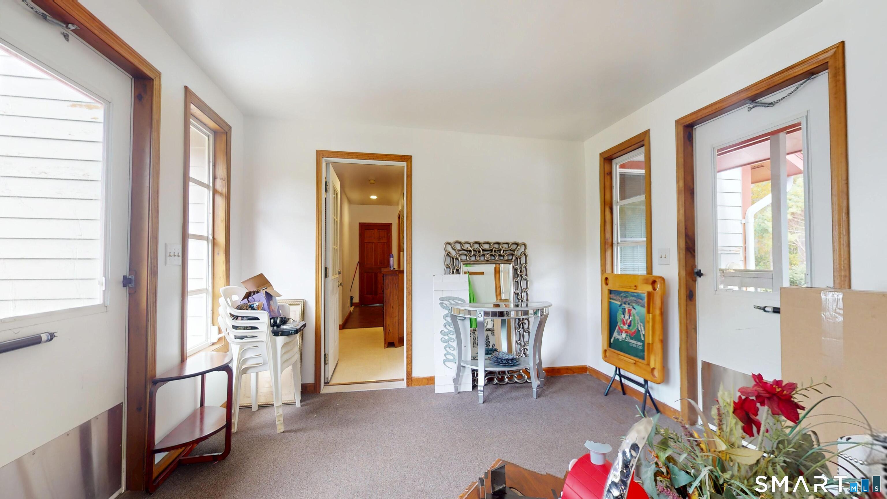 41 Mill Bridge Road Eastford, CT 06242 - Photo 9 of 39 a view of a livingroom with furniture and a window