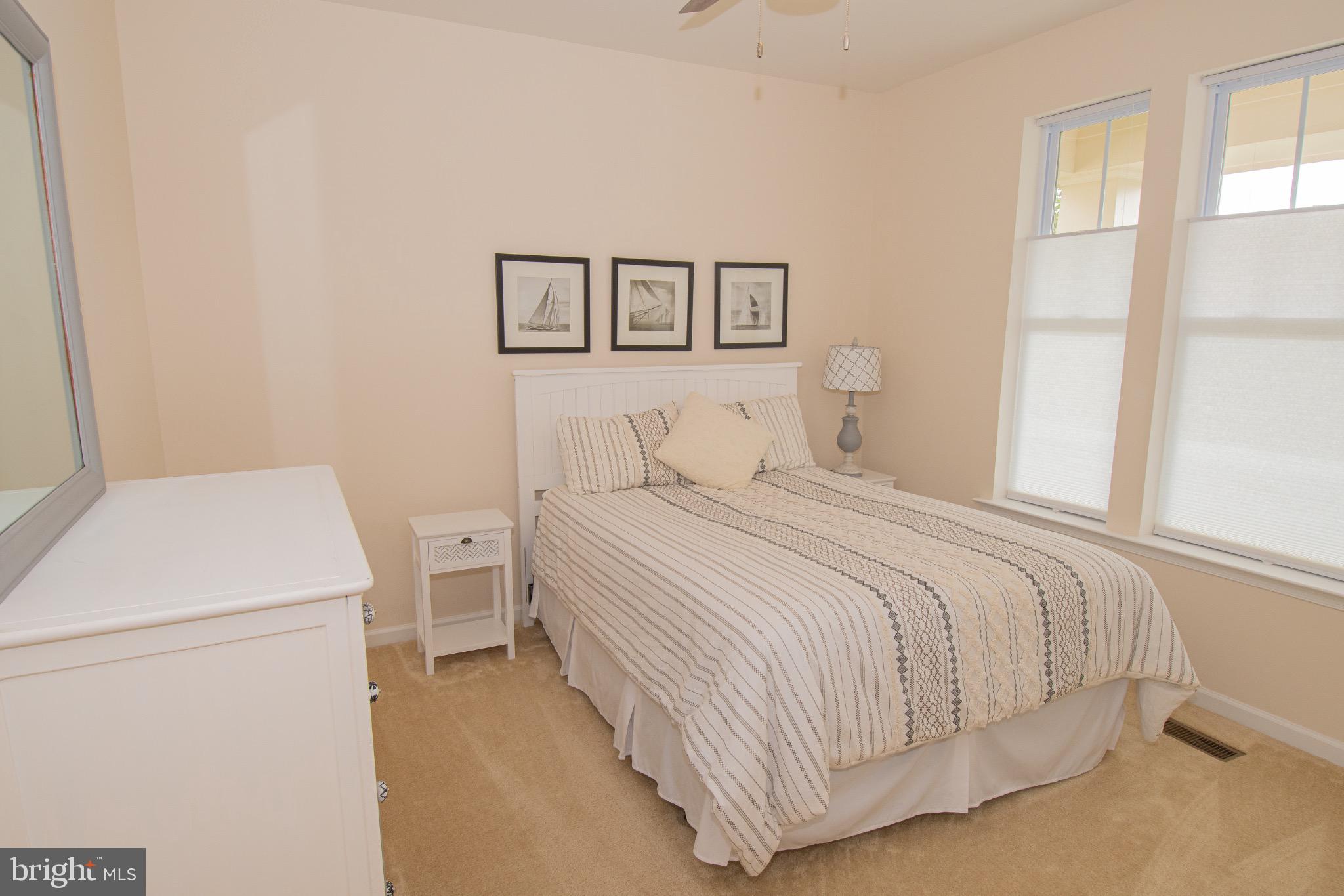 650 Vivaldi Drive Middletown, DE 19709 - Photo 24 of 36 Serene bedroom with natural light and charm.