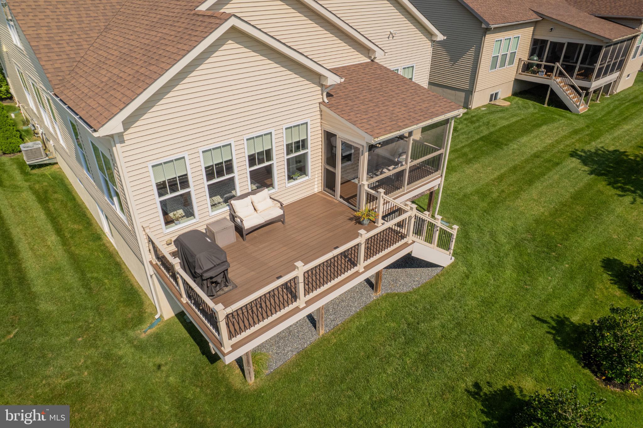 650 Vivaldi Drive Middletown, DE 19709 - Photo 5 of 36 Charming deck with lush green surroundings.