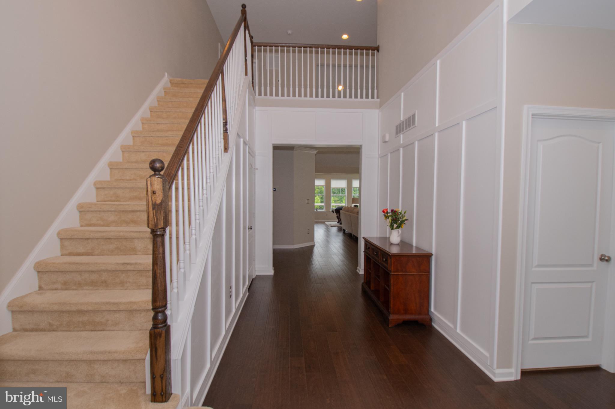 650 Vivaldi Drive Middletown, DE 19709 - Photo 8 of 36 Inviting foyer with elegant staircase.