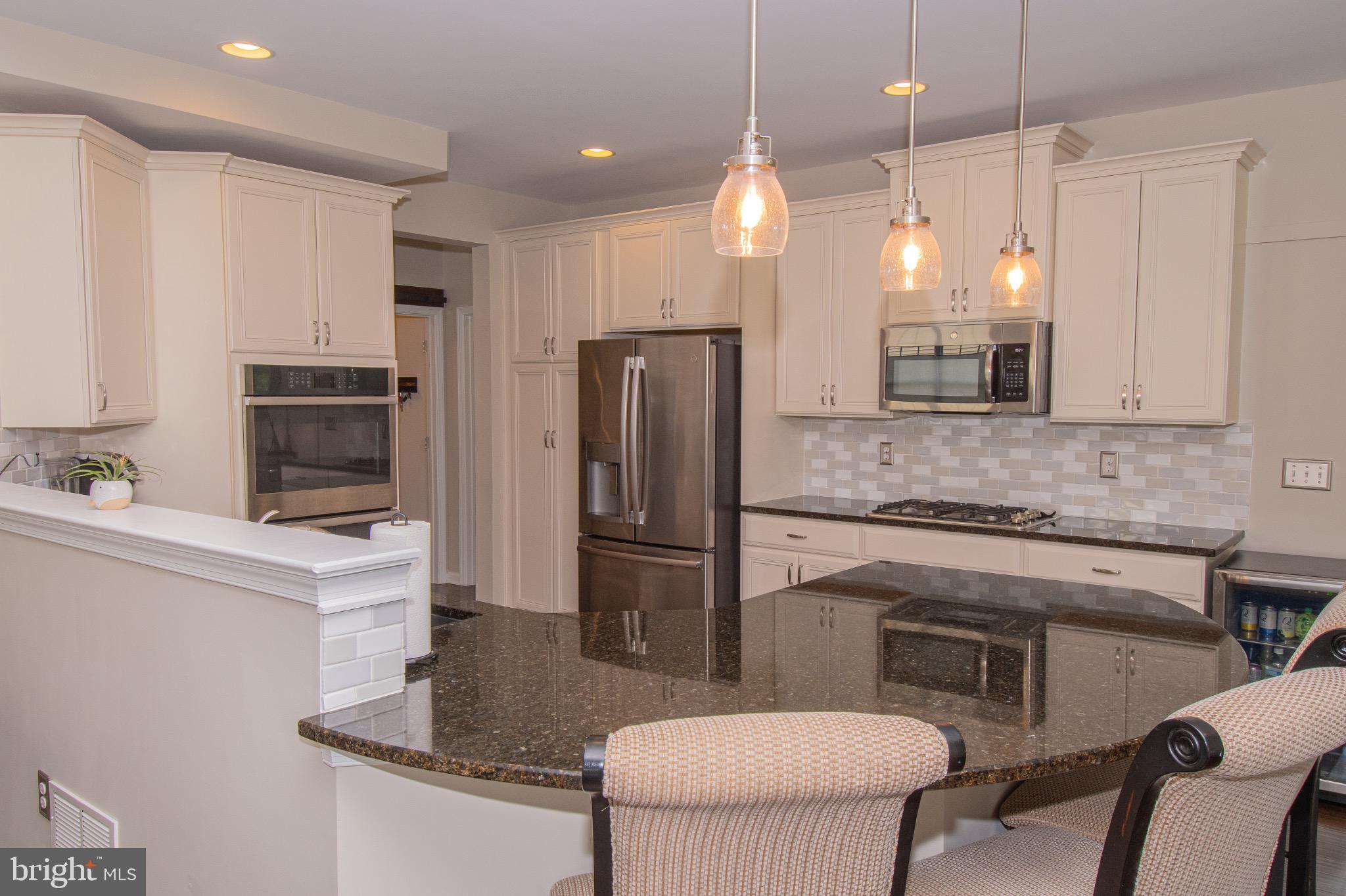 650 Vivaldi Drive Middletown, DE 19709 - Photo 10 of 36 Modern kitchen with elegant finishes.