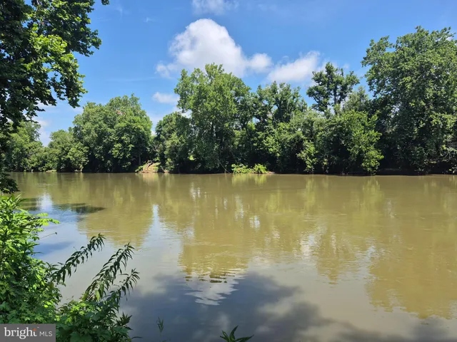 a view of a lake with a outdoor space
