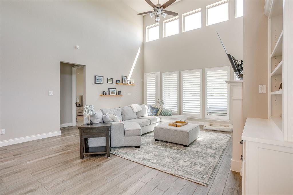 5709 Pope Creek Road Fort Worth, TX 76126 - Photo 17 of 39 Beautiful plantation shutters are installed throughout the home!