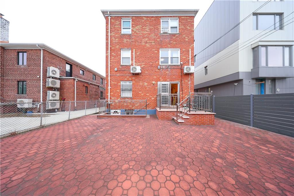 8756 26th Avenue Brooklyn, NY 11214 - Photo 22 of 26 a view of a building with many windows