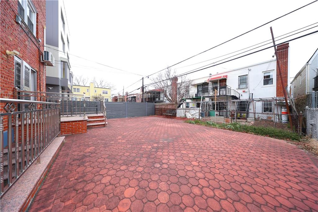 8756 26th Avenue Brooklyn, NY 11214 - Photo 23 of 26 a view of street with parking