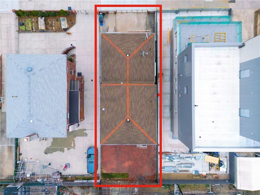 8756 26th Avenue Brooklyn, NY 11214 - Photo 26 of 26 a picture of a bathroom with a sink and a mirror