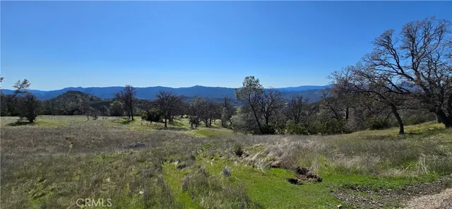 a view of an outdoor space and mountains