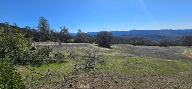 a view of a mountain with a outdoor space