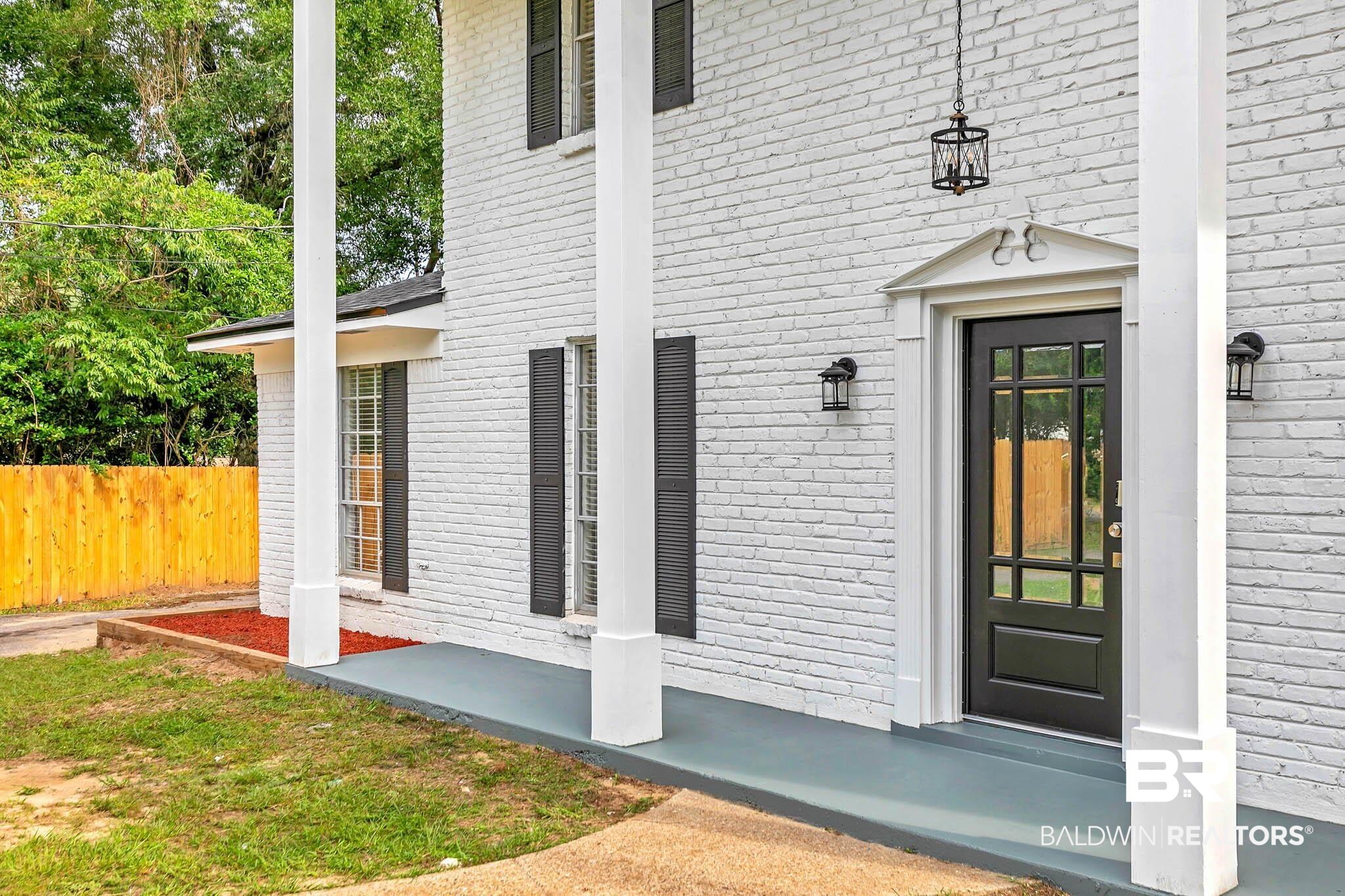 4705 Sherry Court Mobile, AL 36693 - Photo 5 of 100 View of exterior entry with brick siding