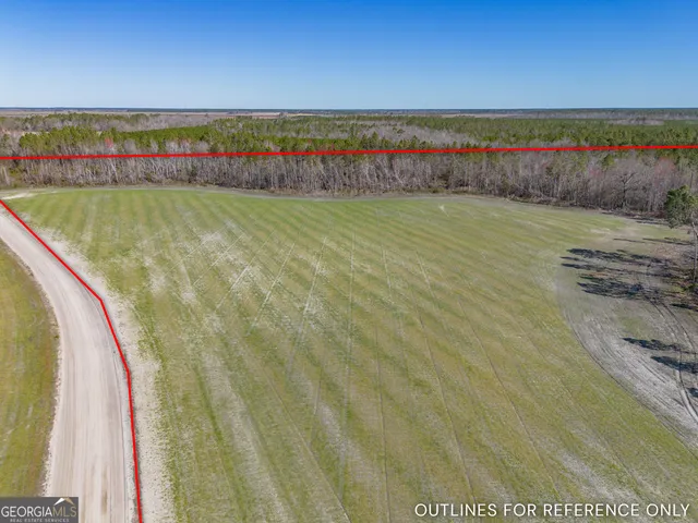 a view of a swimming pool and an outdoor seating
