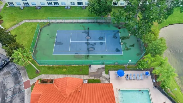 a view of swimming pool with a yard