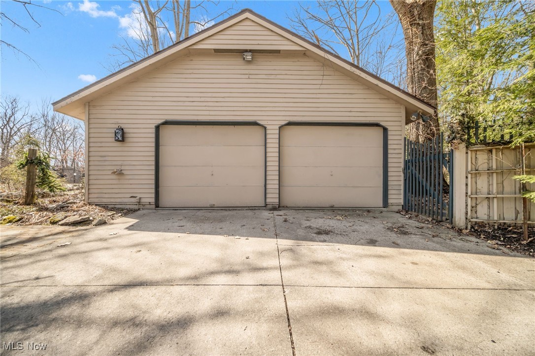 18060 Falling Leaves Road Strongsville, OH 44136 - Photo 35 of 43 Detached garage with fence