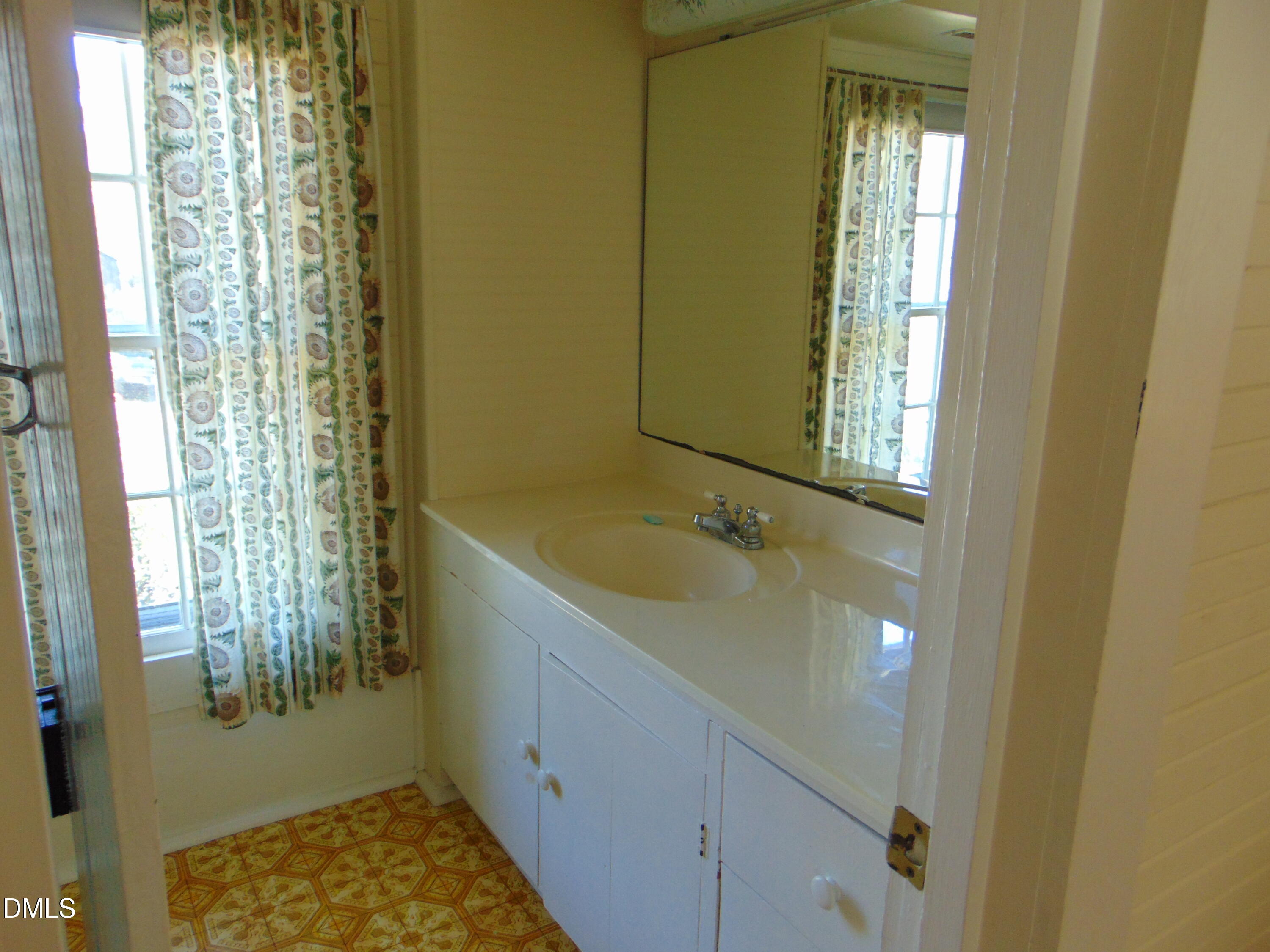 4067 Chewning Road Oxford, NC 27565 - Photo 73 of 82 a bathroom with a sink and a shower
