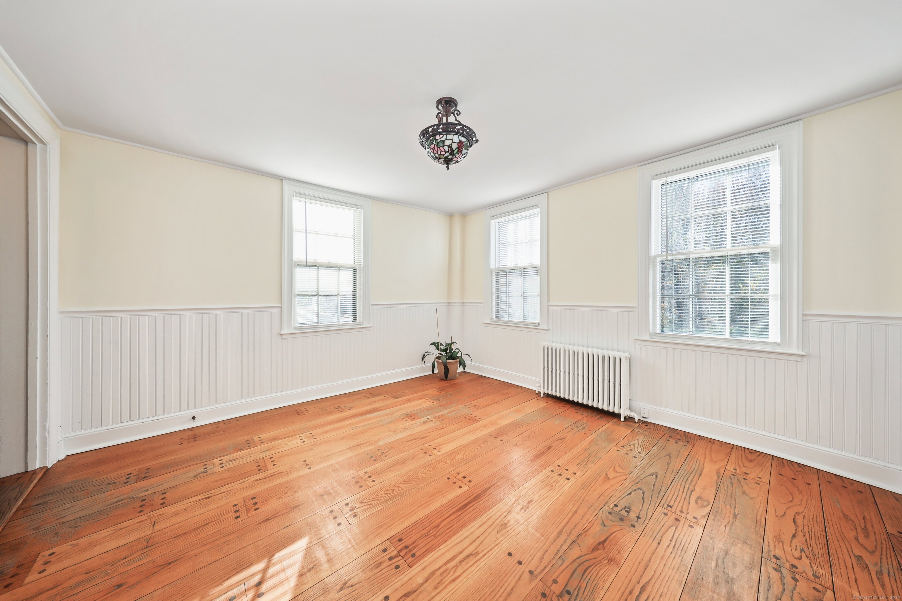 20 Hydelor Avenue Prospect, CT 06712 - Photo 17 of 40 wooden floor in an empty room with a window