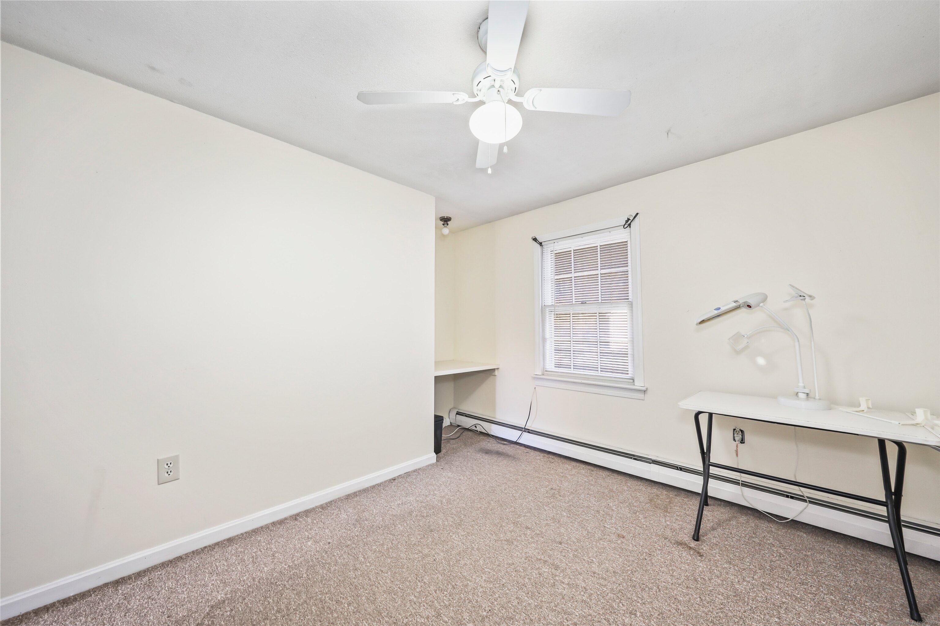 20 Hydelor Avenue Prospect, CT 06712 - Photo 19 of 40 an empty room with windows and fan