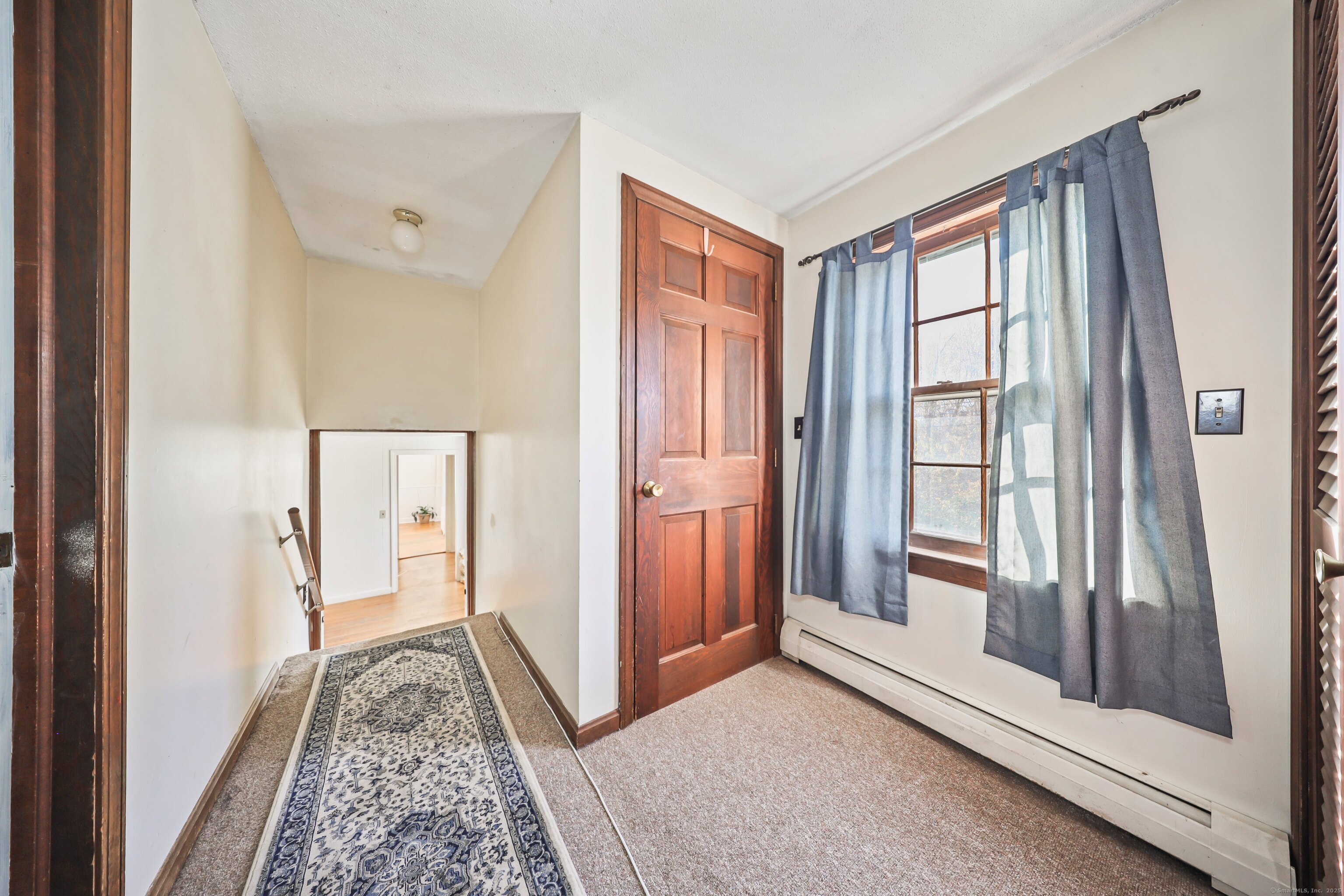20 Hydelor Avenue Prospect, CT 06712 - Photo 22 of 40 a view of a hallway to rooms and stairs