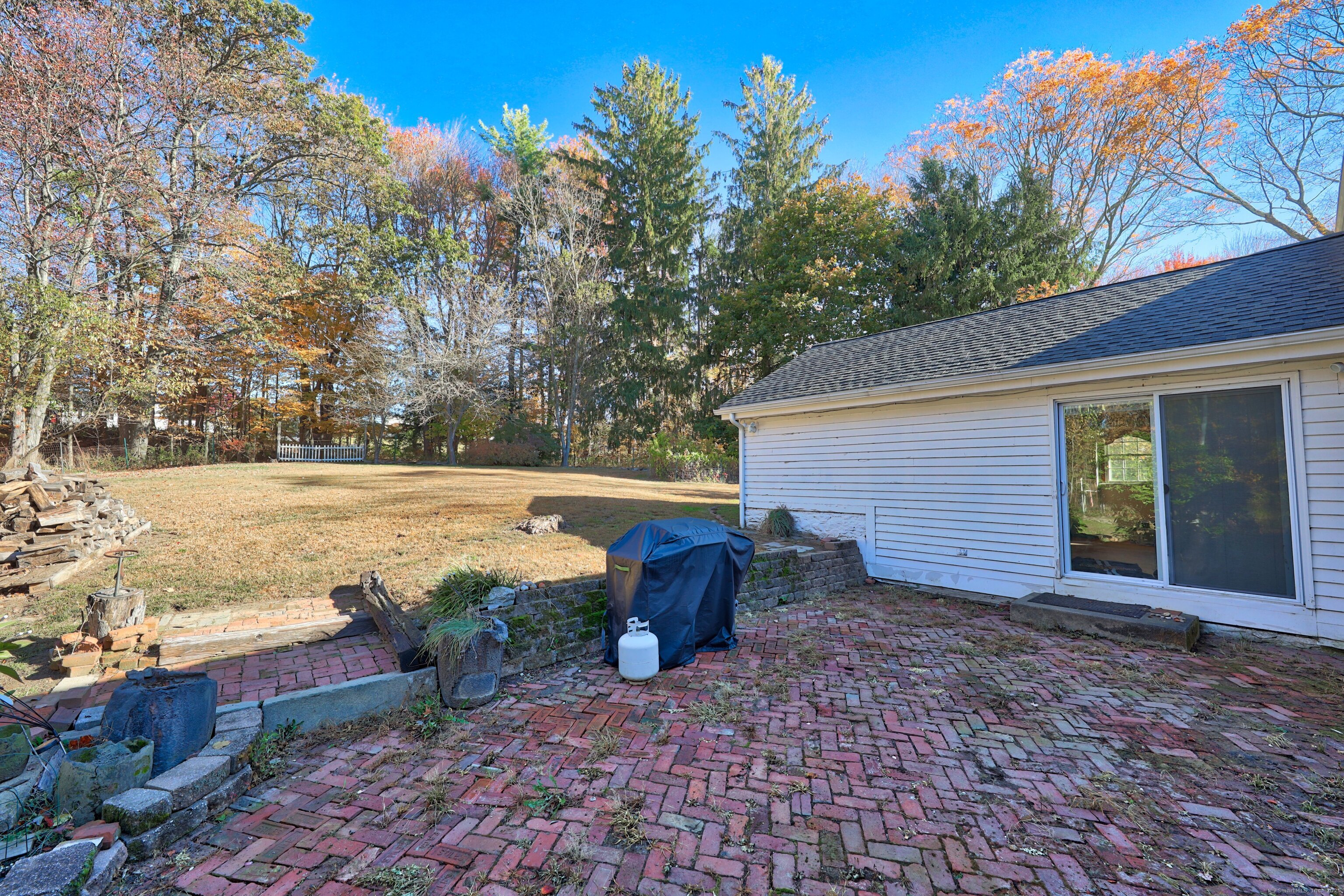 20 Hydelor Avenue Prospect, CT 06712 - Photo 35 of 40 a view of a backyard with wooden fence
