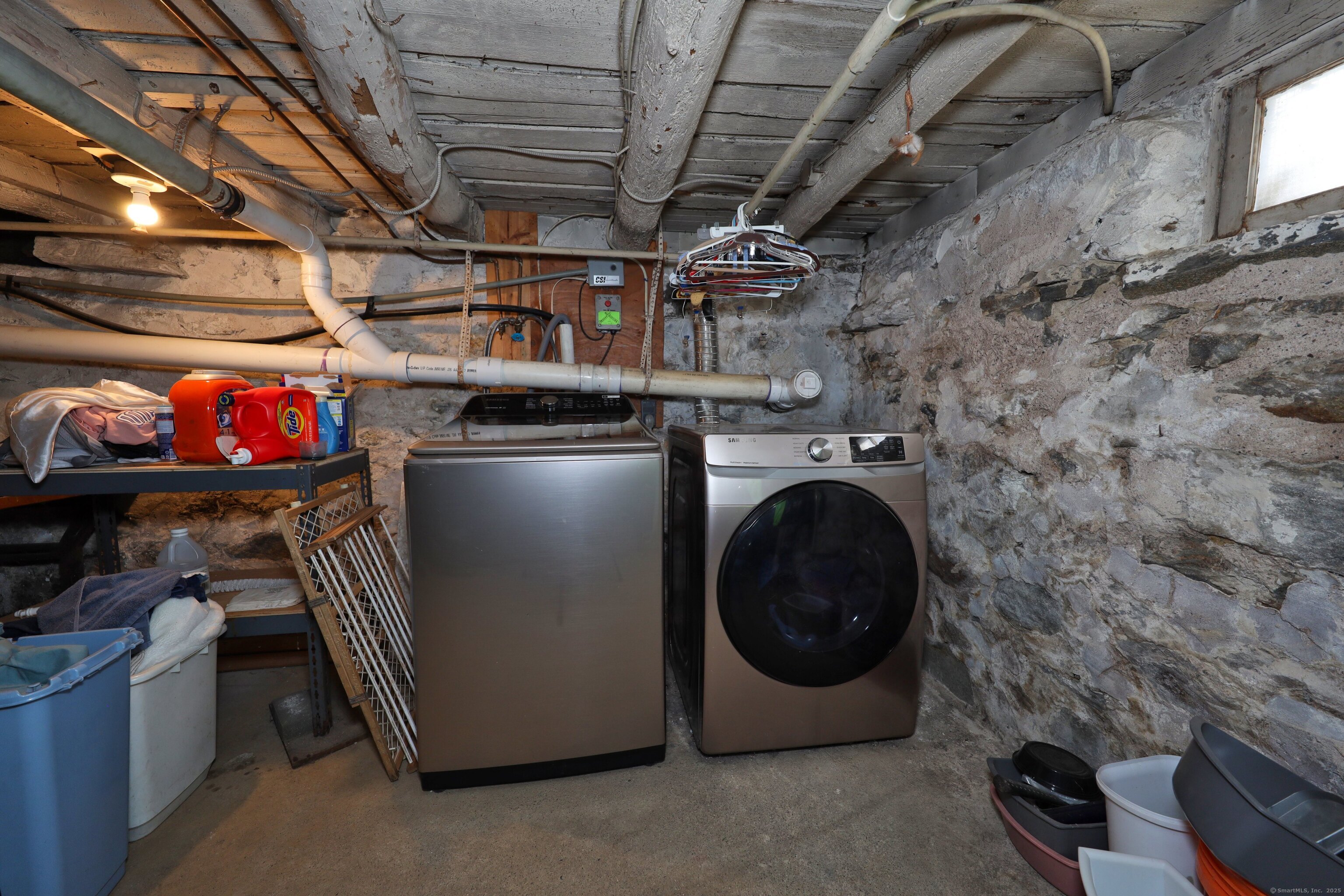 20 Hydelor Avenue Prospect, CT 06712 - Photo 36 of 40 a utility room with dryer washer and stair