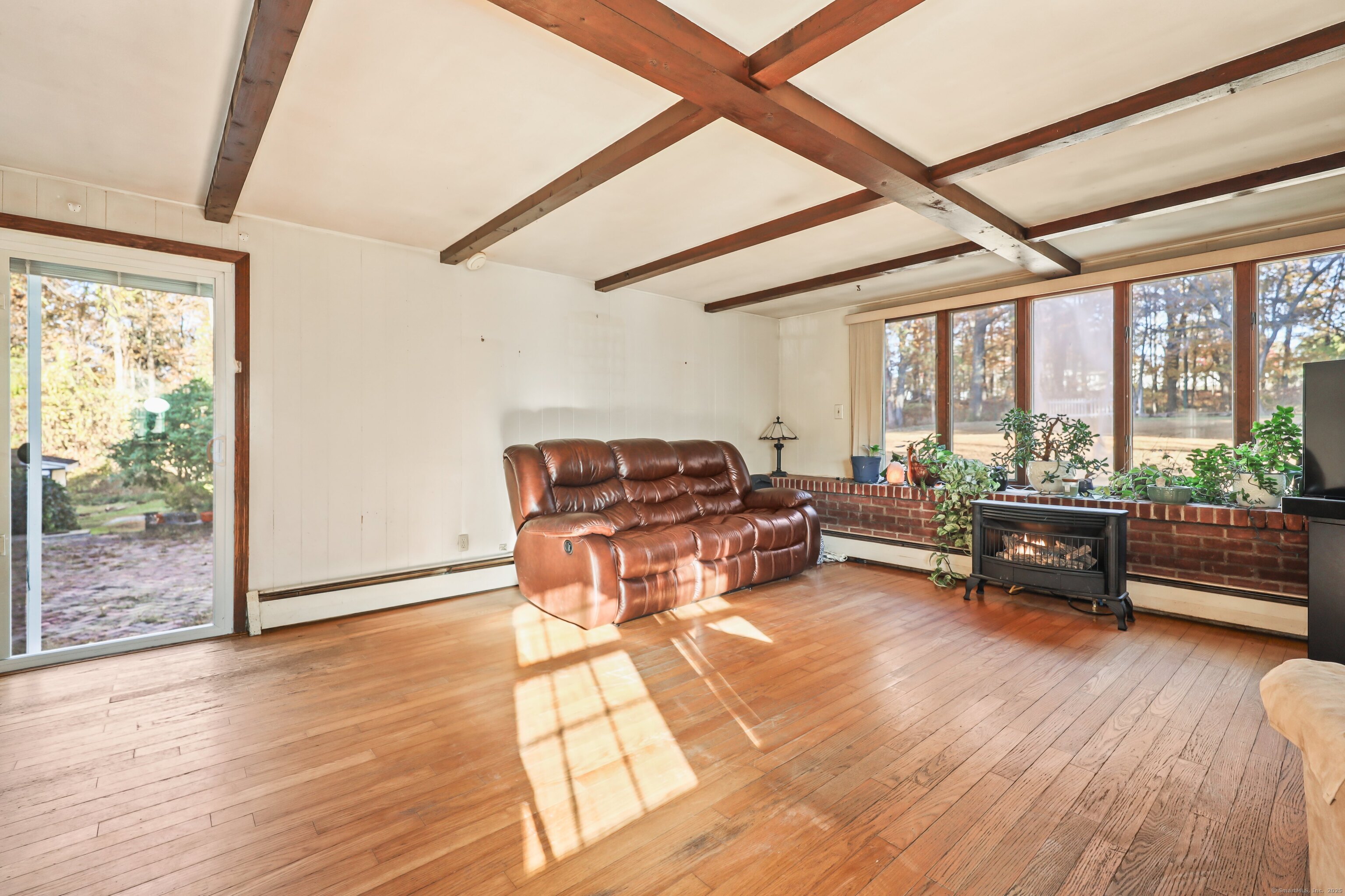 20 Hydelor Avenue Prospect, CT 06712 - Photo 8 of 40 a living room with furniture and a wooden floor