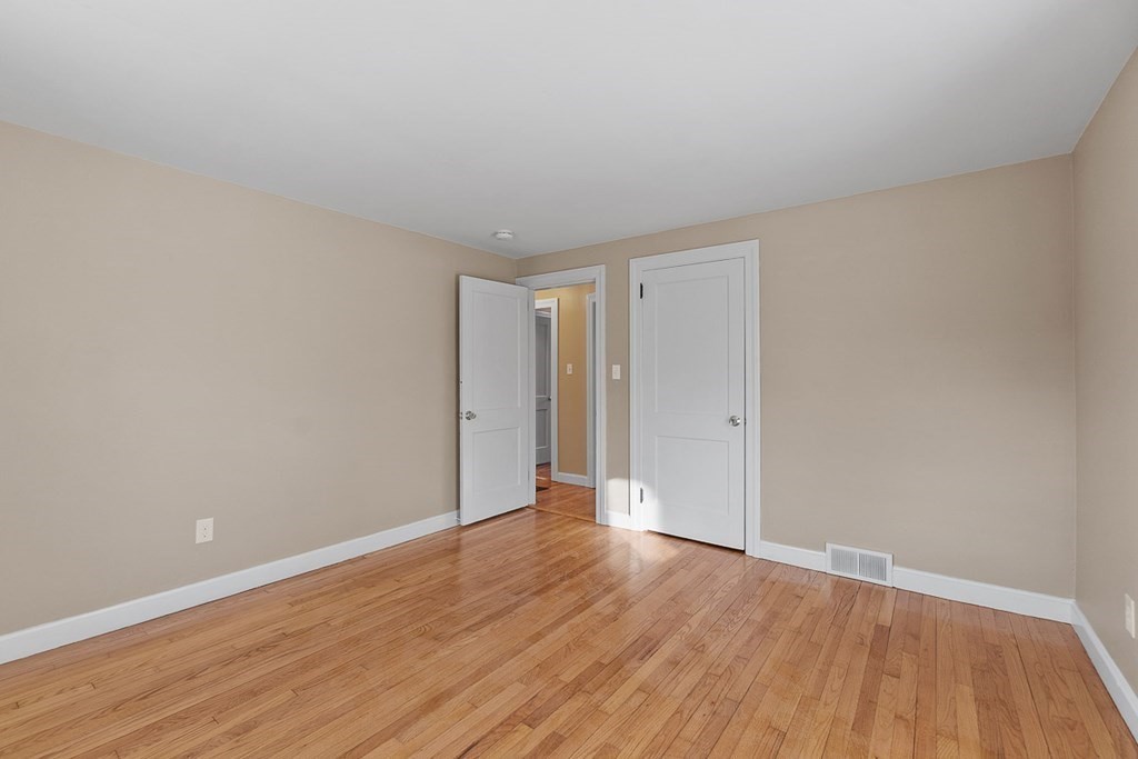22 Parker Road Shirley, MA 01464 - Photo 12 of 41 a view of an empty room with wooden floor
