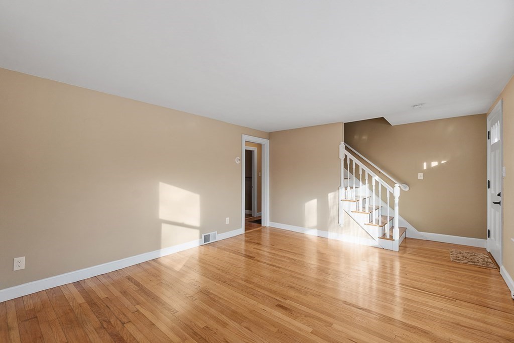 22 Parker Road Shirley, MA 01464 - Photo 21 of 41 a view of empty room with wooden floor
