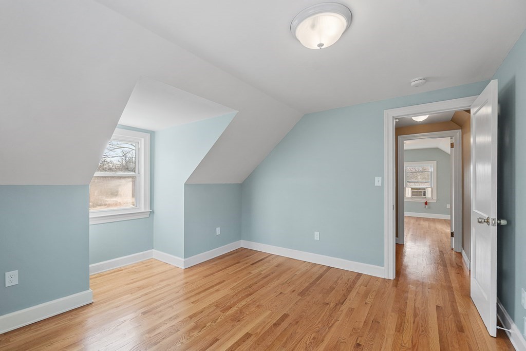 22 Parker Road Shirley, MA 01464 - Photo 27 of 41 wooden floor in an empty room with a window