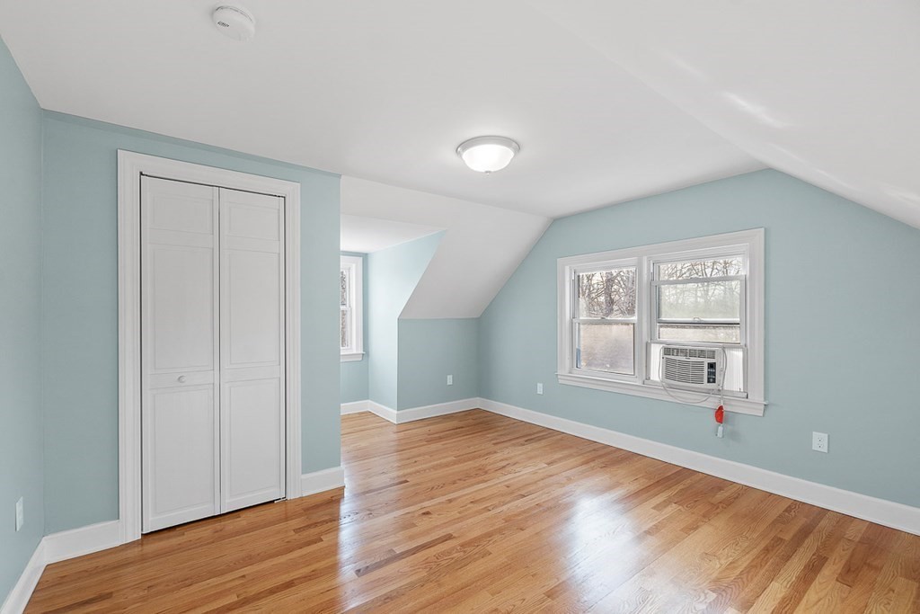 22 Parker Road Shirley, MA 01464 - Photo 28 of 41 a view of empty room with wooden floor and fan