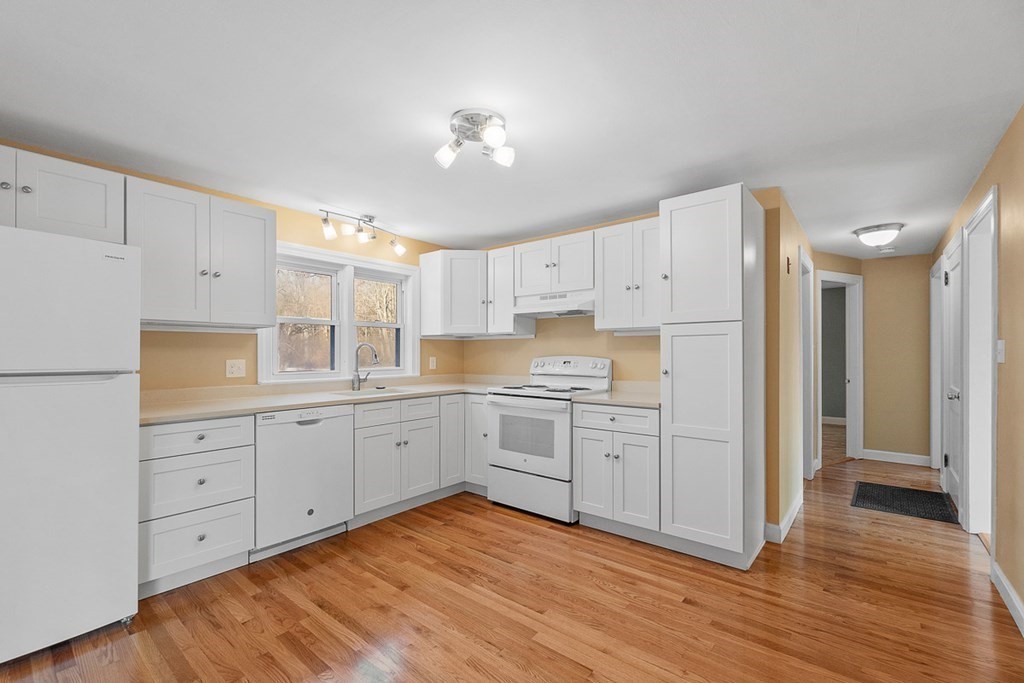 22 Parker Road Shirley, MA 01464 - Photo 3 of 41 a kitchen with cabinets oven and a dishwasher