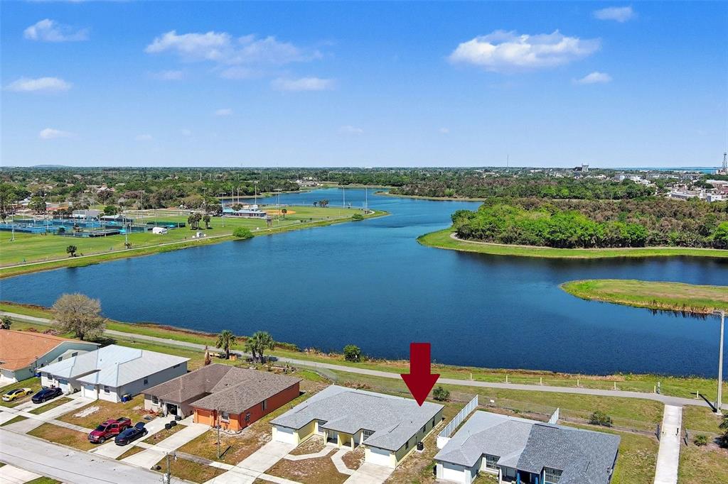 816 Angela Avenue, Unit B Rockledge, FL 32955 - Photo 16 of 34 an aerial view of a house with a lake view