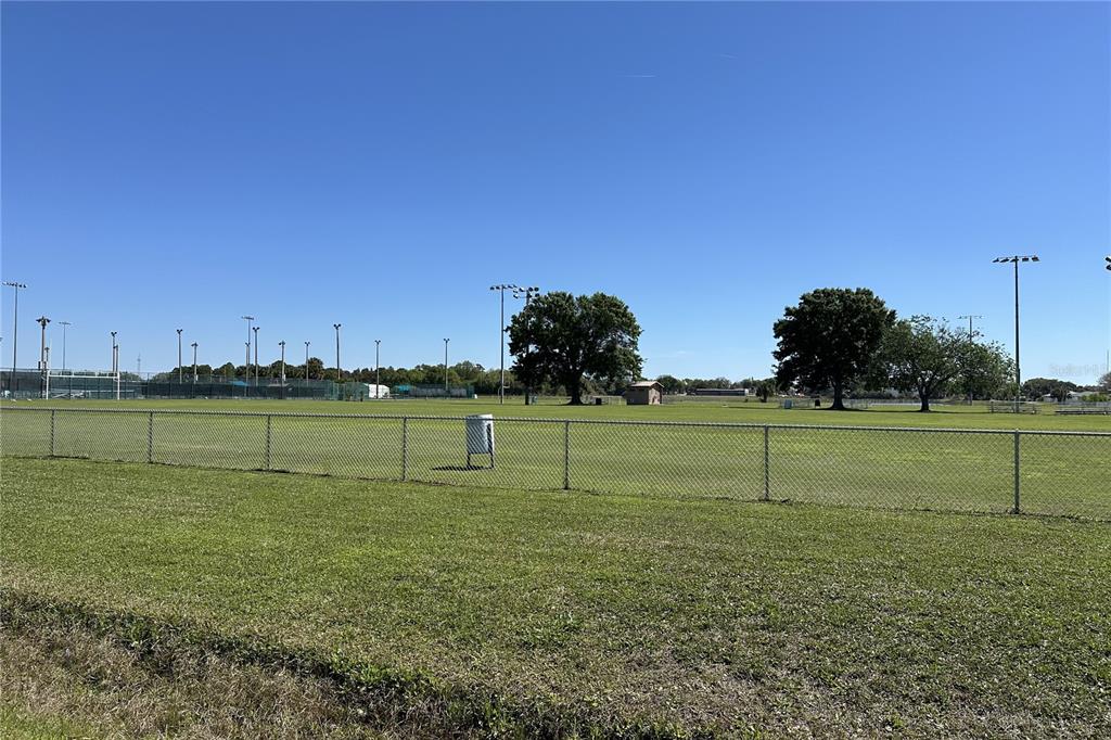 816 Angela Avenue, Unit B Rockledge, FL 32955 - Photo 18 of 34 a view of a golf course with a lake