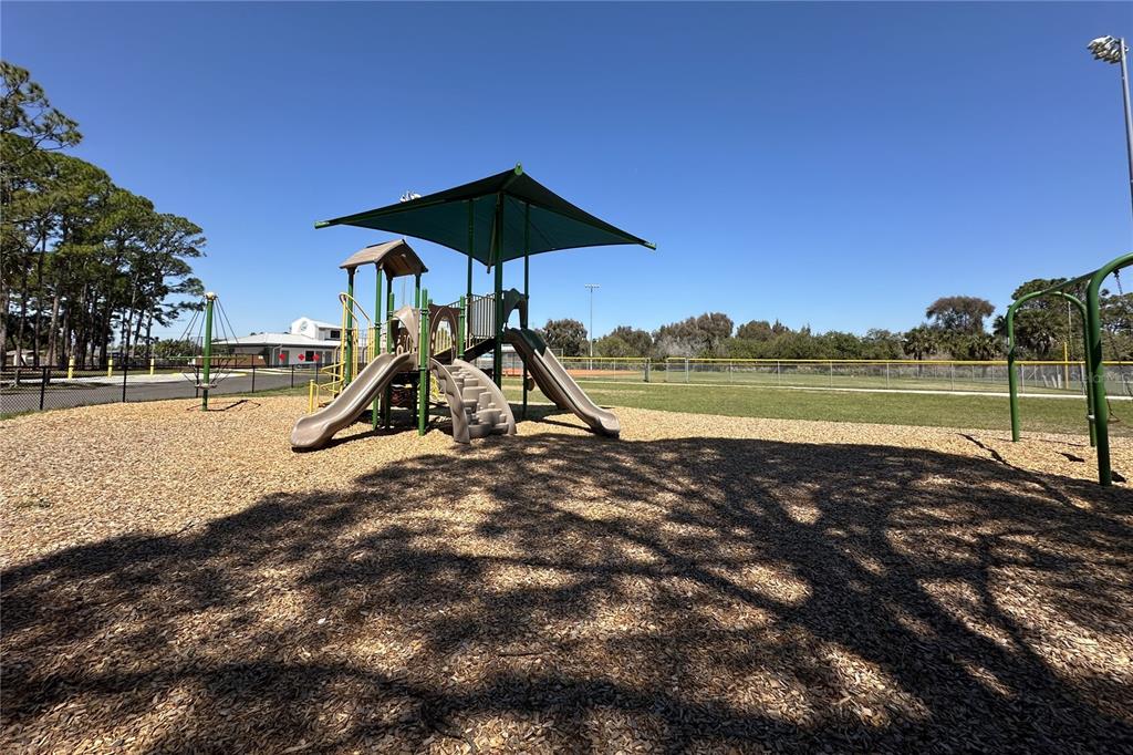 816 Angela Avenue, Unit B Rockledge, FL 32955 - Photo 27 of 34 a view of a park with a slide
