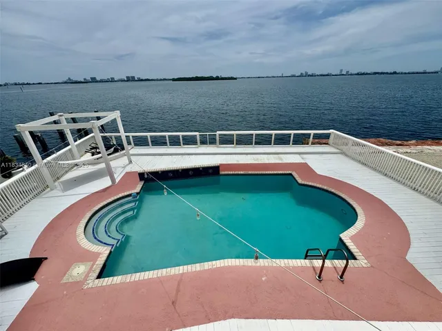 a view of a chairs and table on the terrace