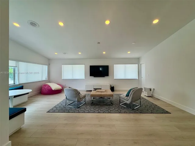 a living room with furniture and a couch