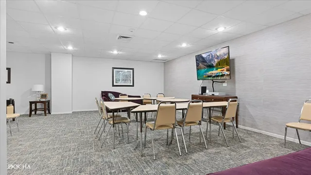 a view of a dining room with furniture