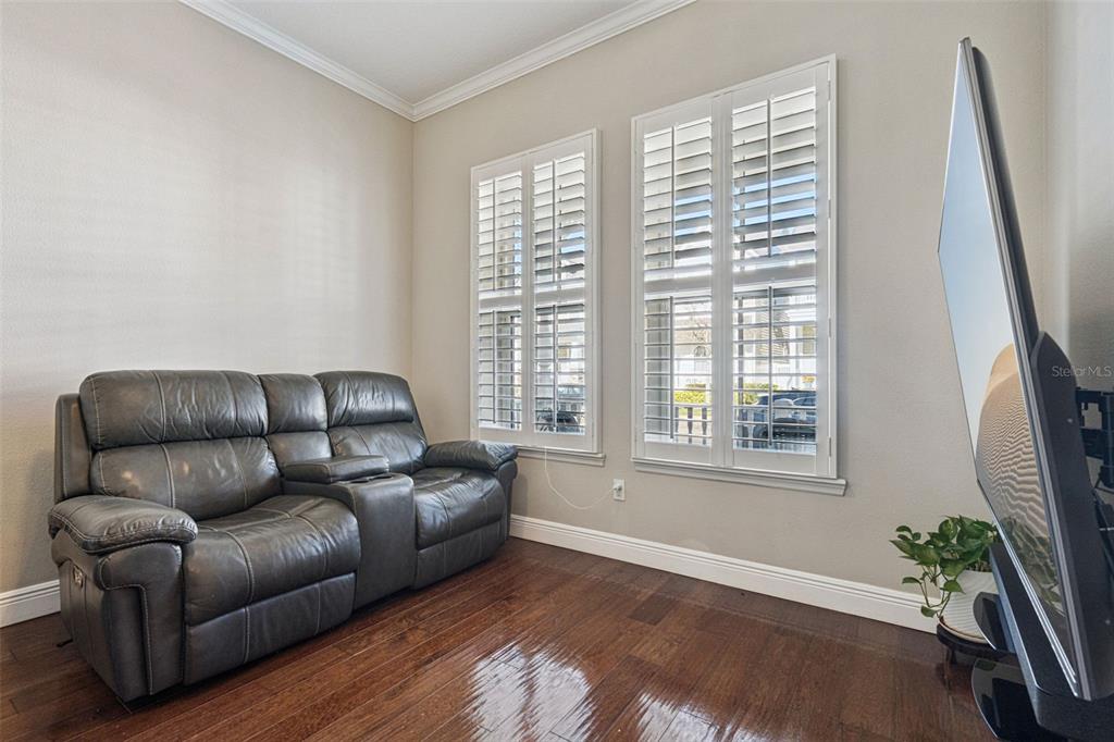 1565 Castile Street Celebration, FL 34747 - Photo 11 of 82 a living room with furniture and a window