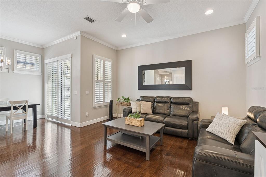 1565 Castile Street Celebration, FL 34747 - Photo 15 of 82 a living room with furniture and a large window