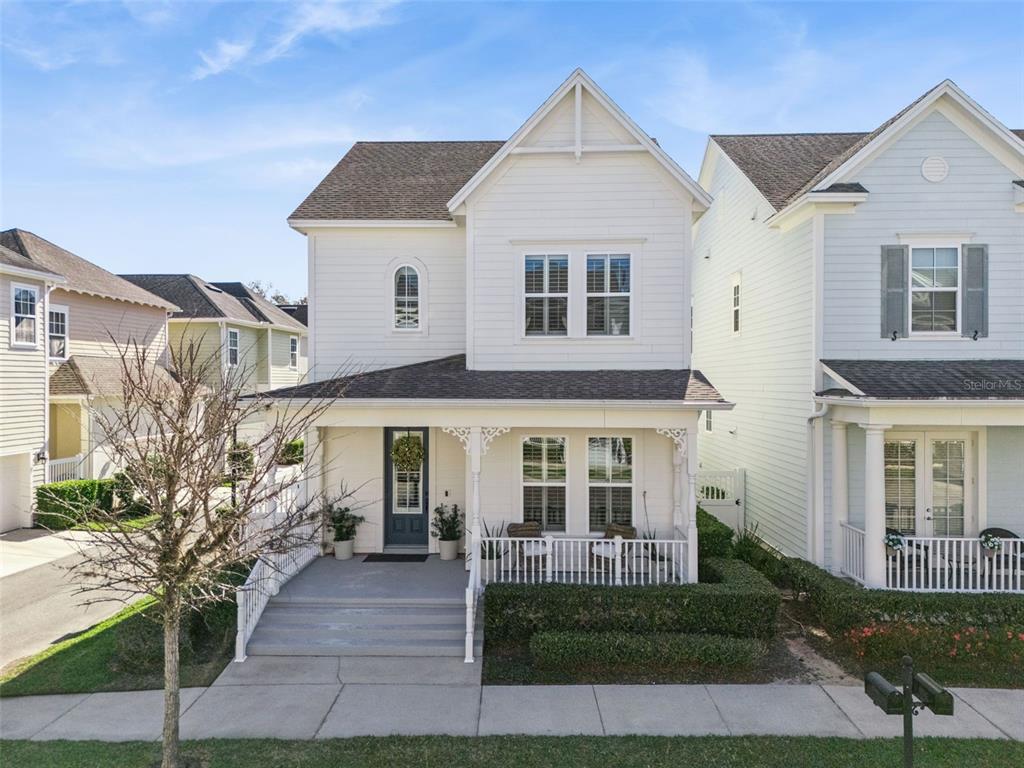 1565 Castile Street Celebration, FL 34747 - Photo 55 of 82 a front view of a house with a yard