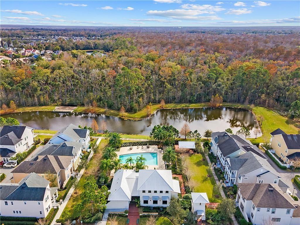 1565 Castile Street Celebration, FL 34747 - Photo 65 of 82 an aerial view of a house with a lake view