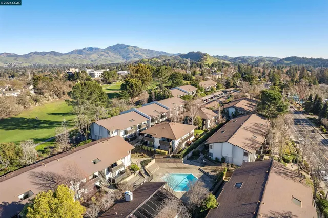 an aerial view of residential house with an outdoor space