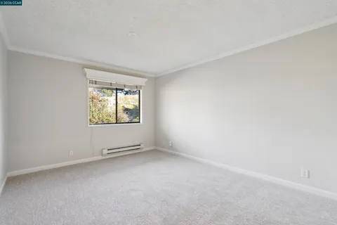 a view of a street with sitting area