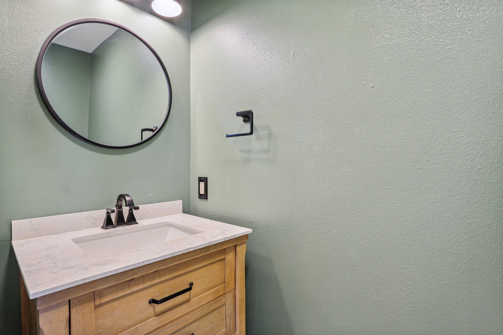 905 Switchgrass Lane Champaign, IL 61822 - Photo 20 of 51 a bathroom with a sink and a mirror
