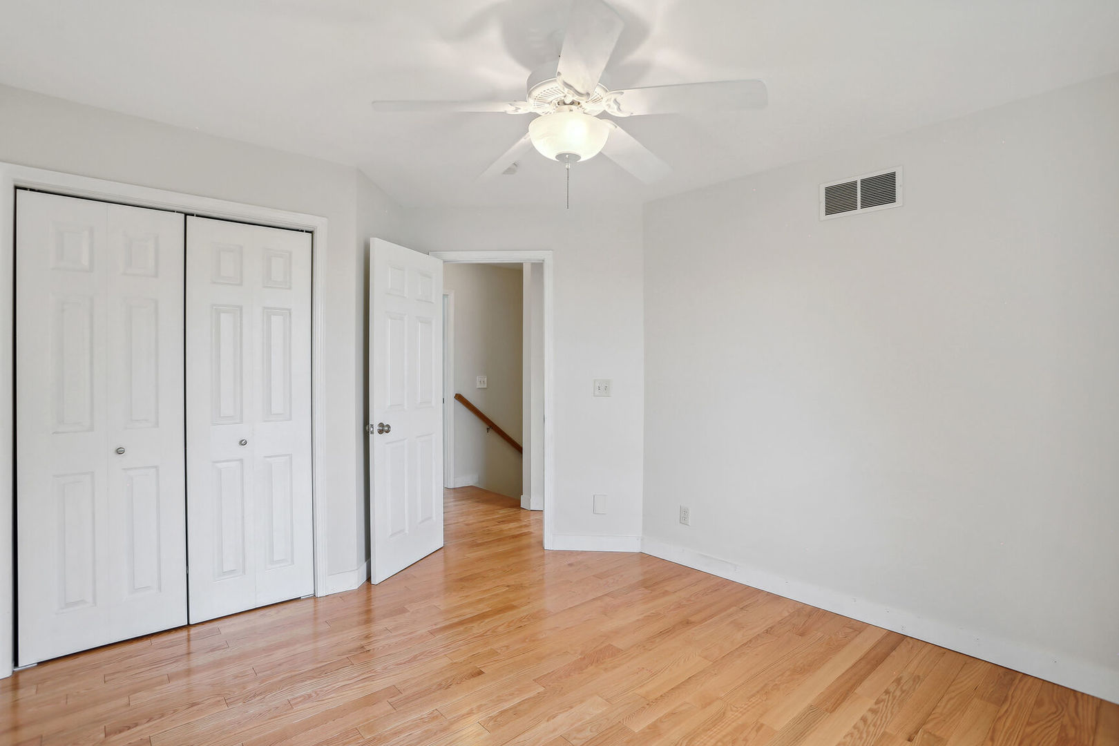 905 Switchgrass Lane Champaign, IL 61822 - Photo 28 of 51 a view of an empty room with wooden floor