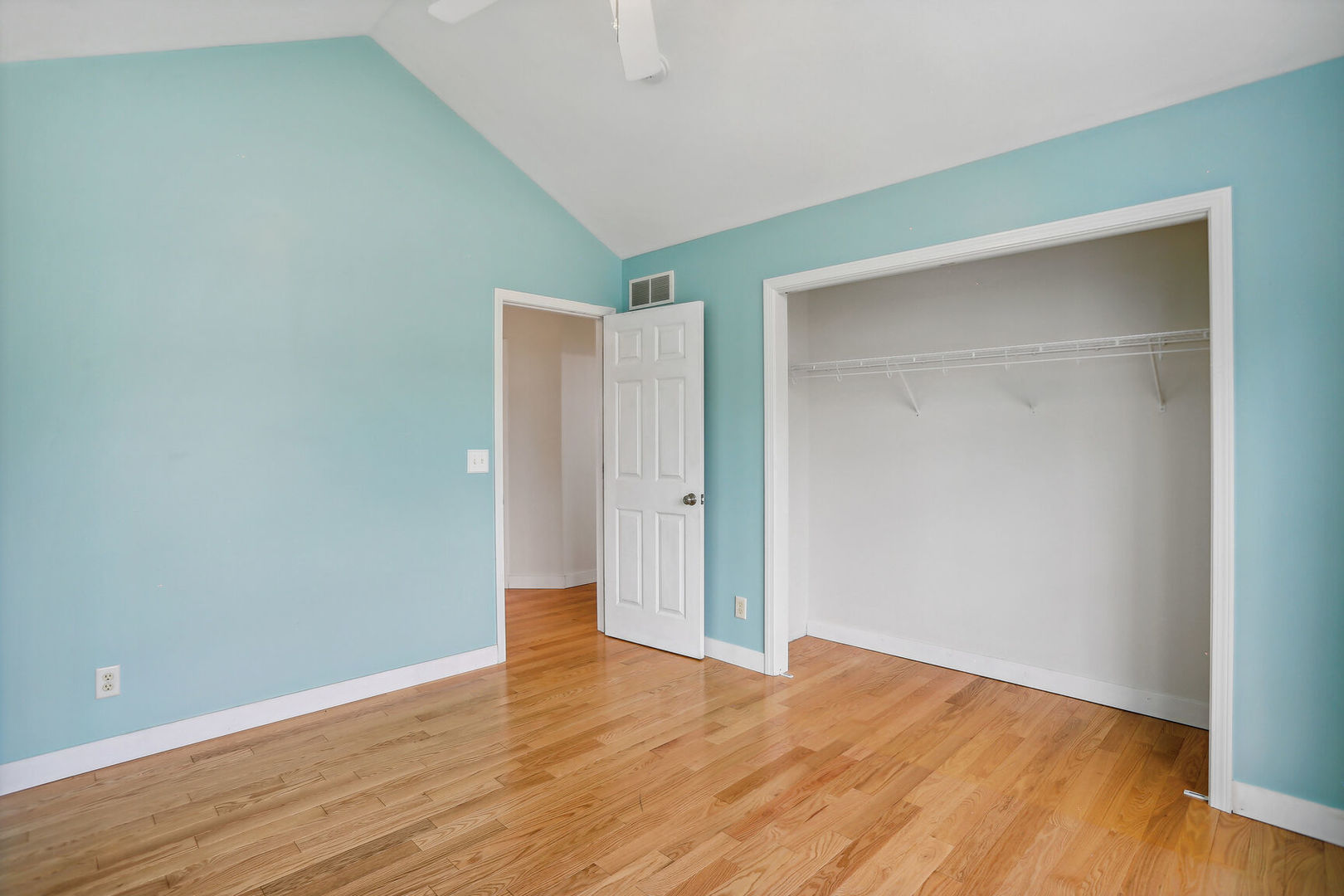 905 Switchgrass Lane Champaign, IL 61822 - Photo 32 of 51 a view of an empty room with wooden floor and closet